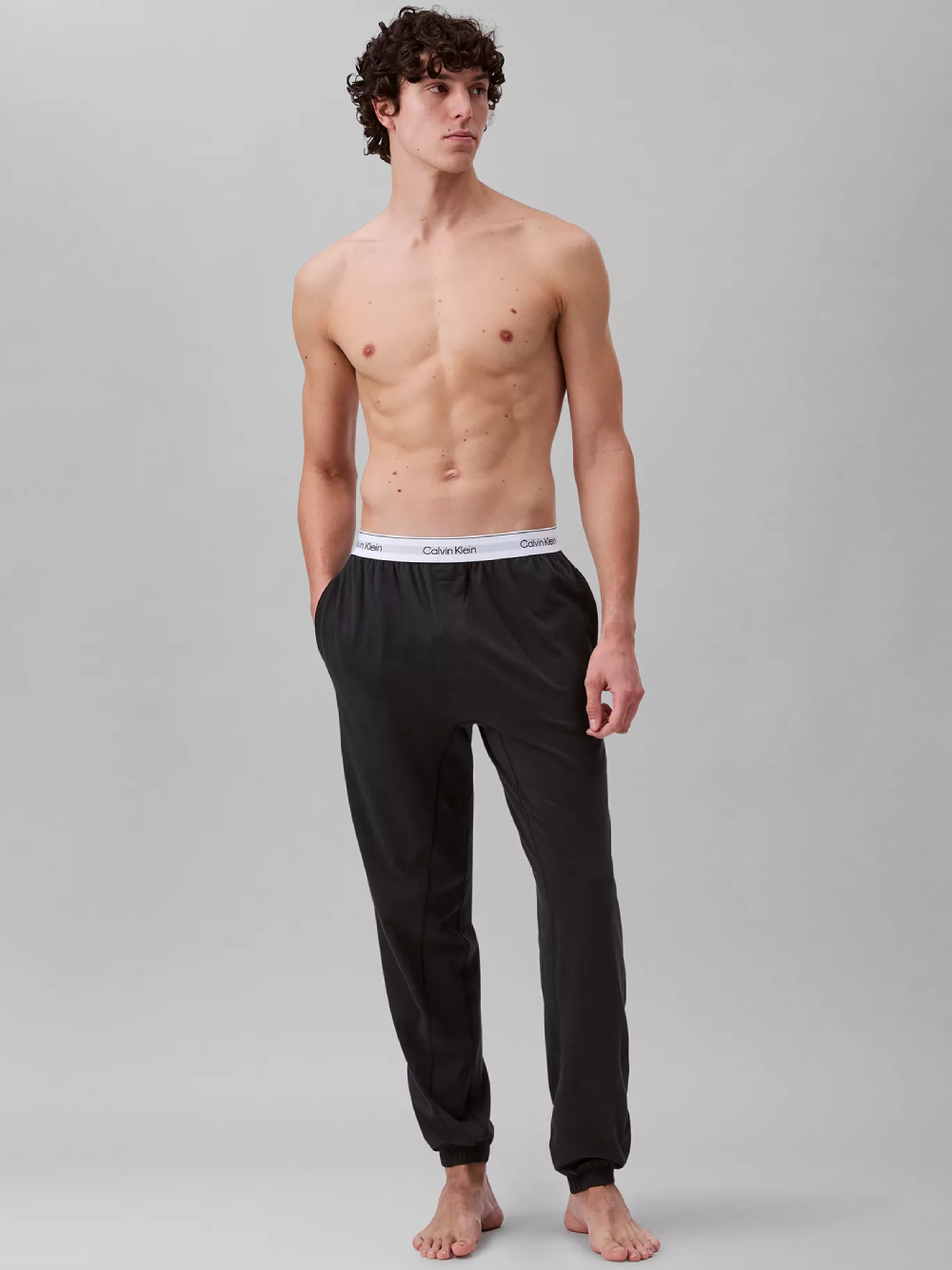 detail Calvin Klein pánské černé tepláky