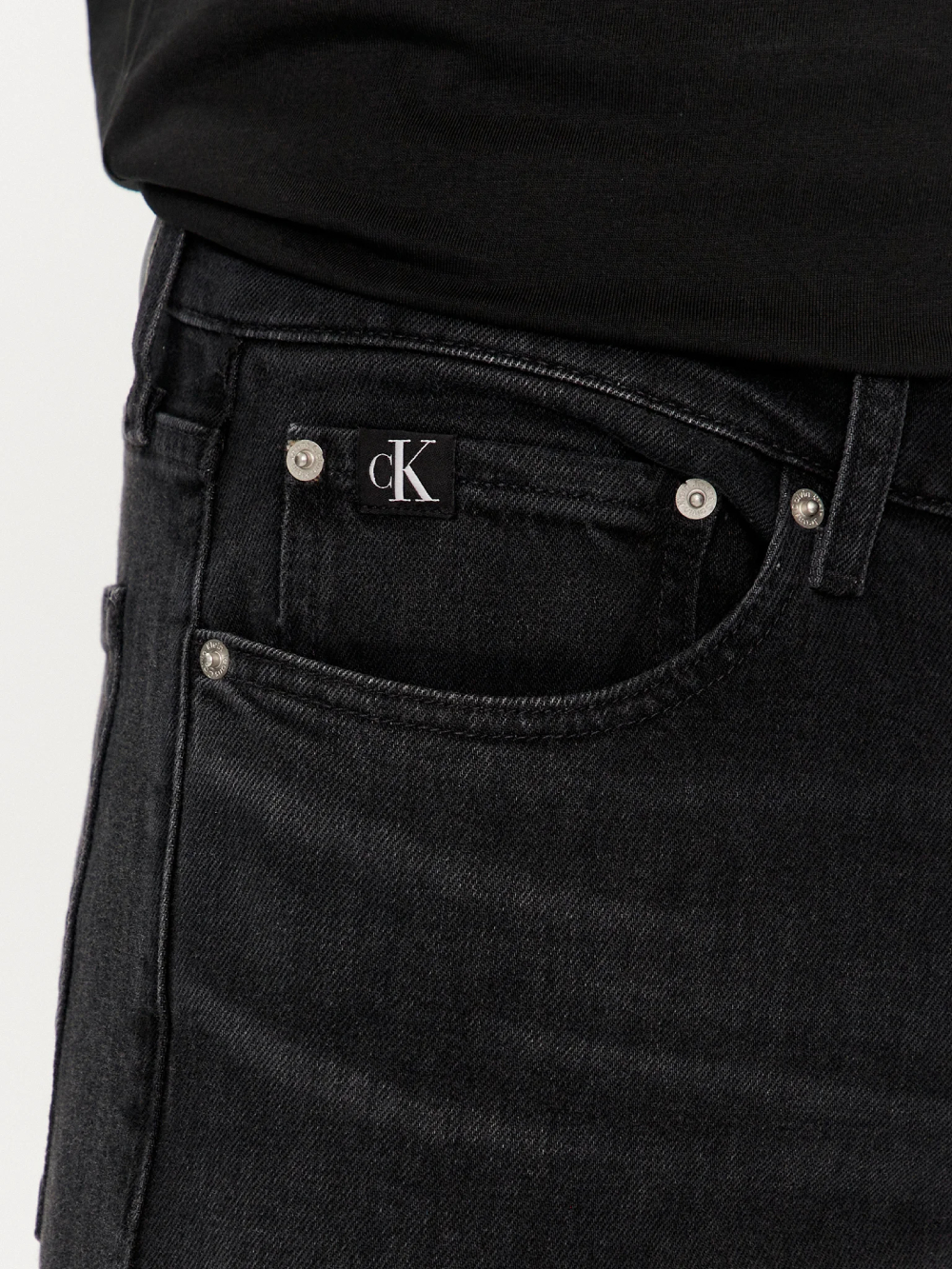 detail Calvin Klein pánské černé džíny