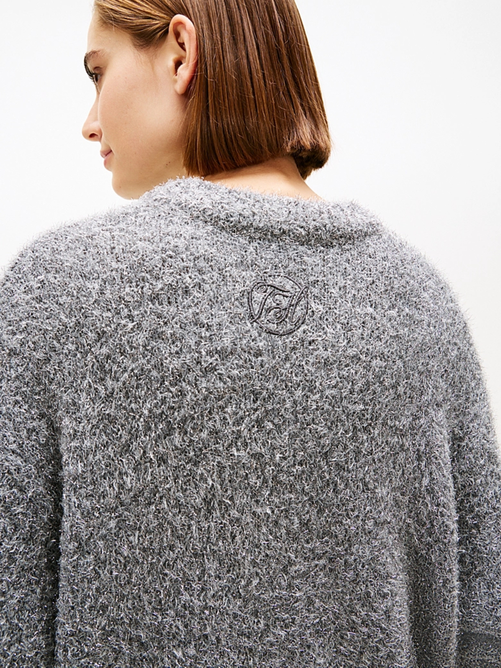 detail Tommy Hilfiger dámský šedý svetr