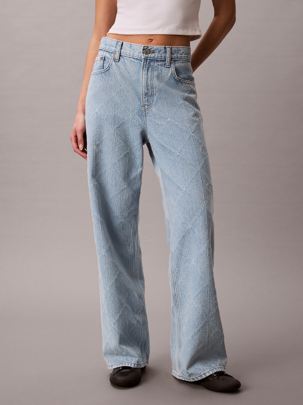 detail Calvin Klein dámské modré baggy džíny