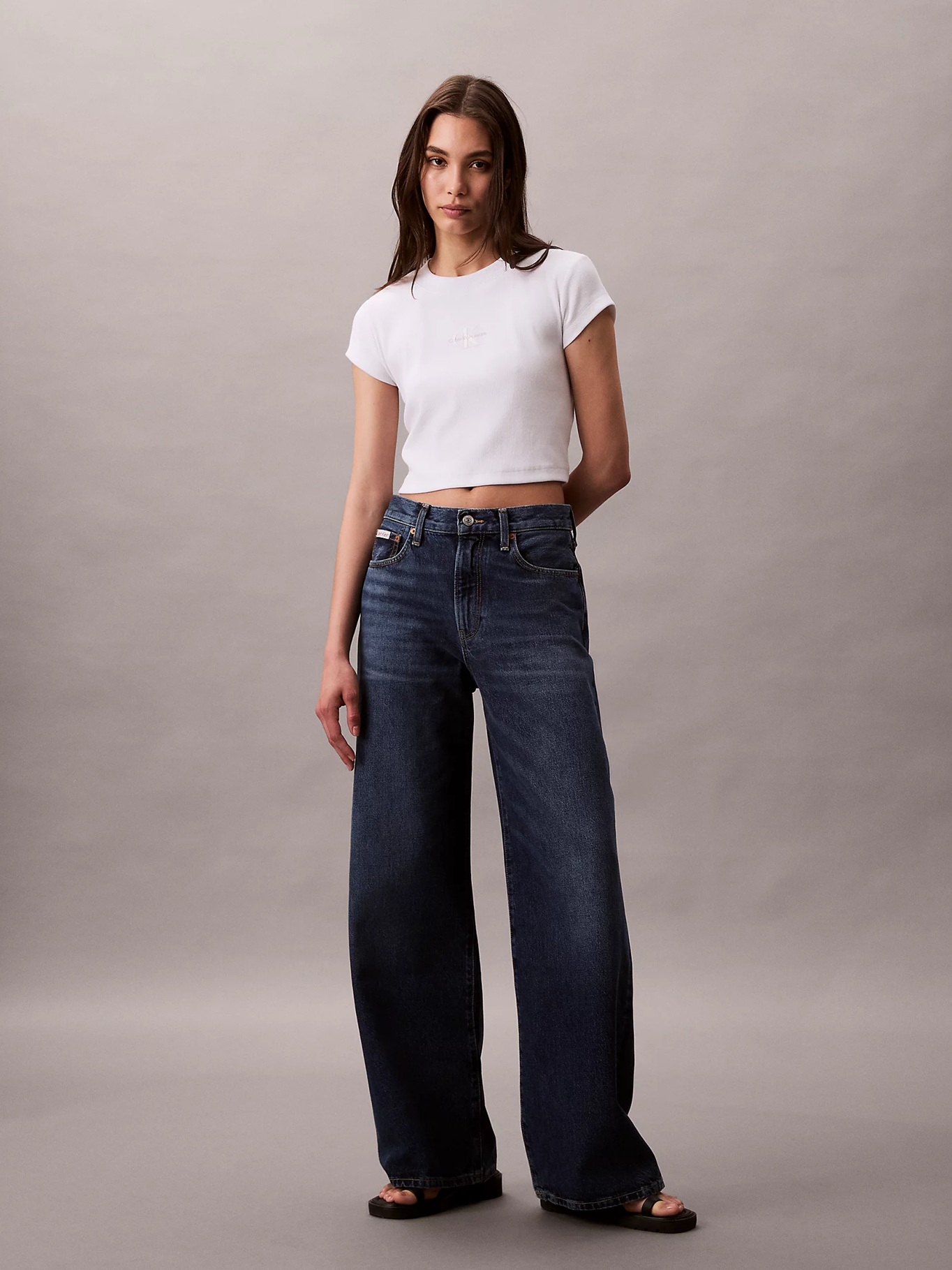 detail Calvin Klein dámské tmavě modré džíny