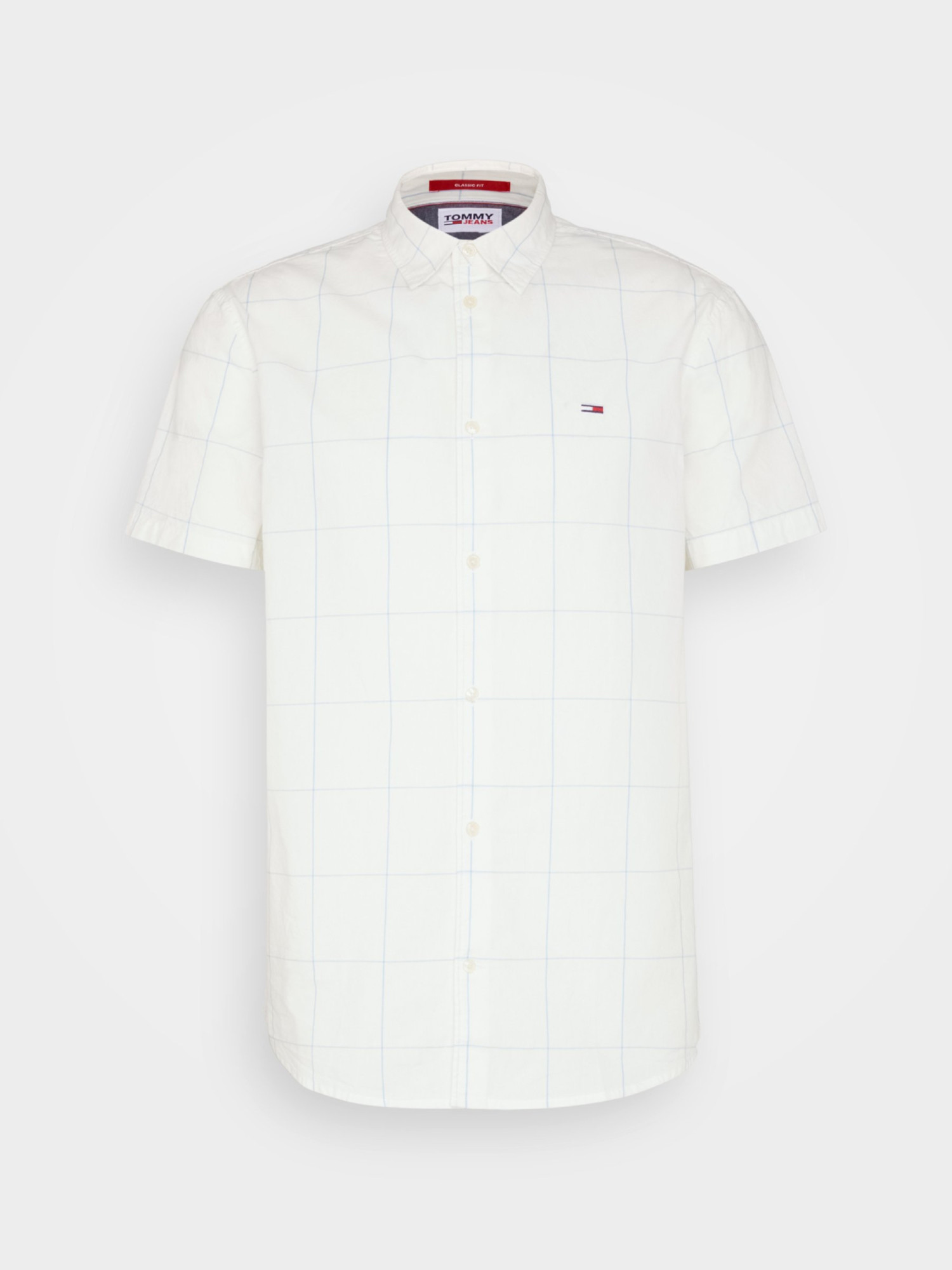 detail Tommy Jeans pánská bílá košile s krátkým rukávem