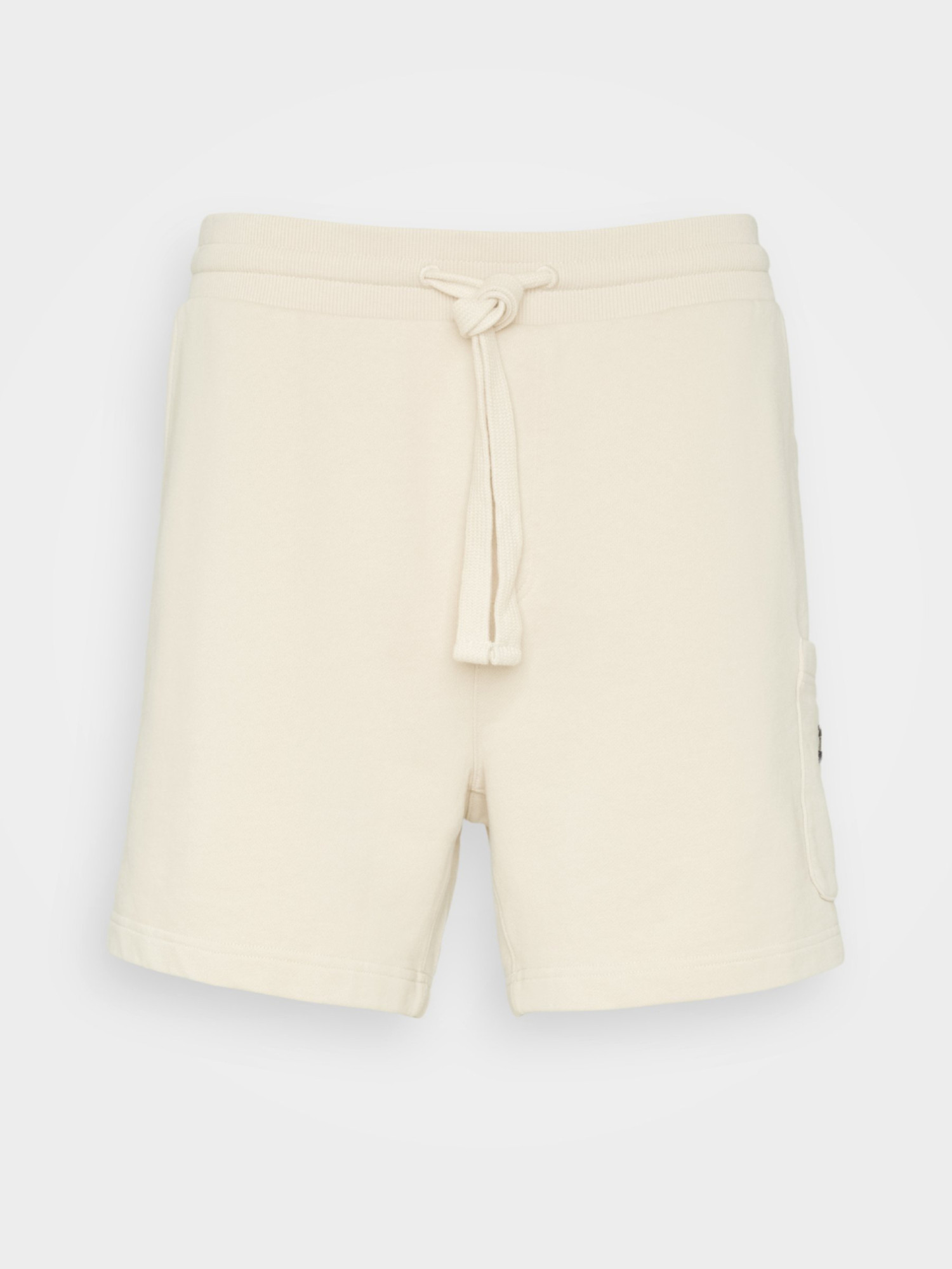 detail Tommy Jeans pánské béžové teplákové šortky