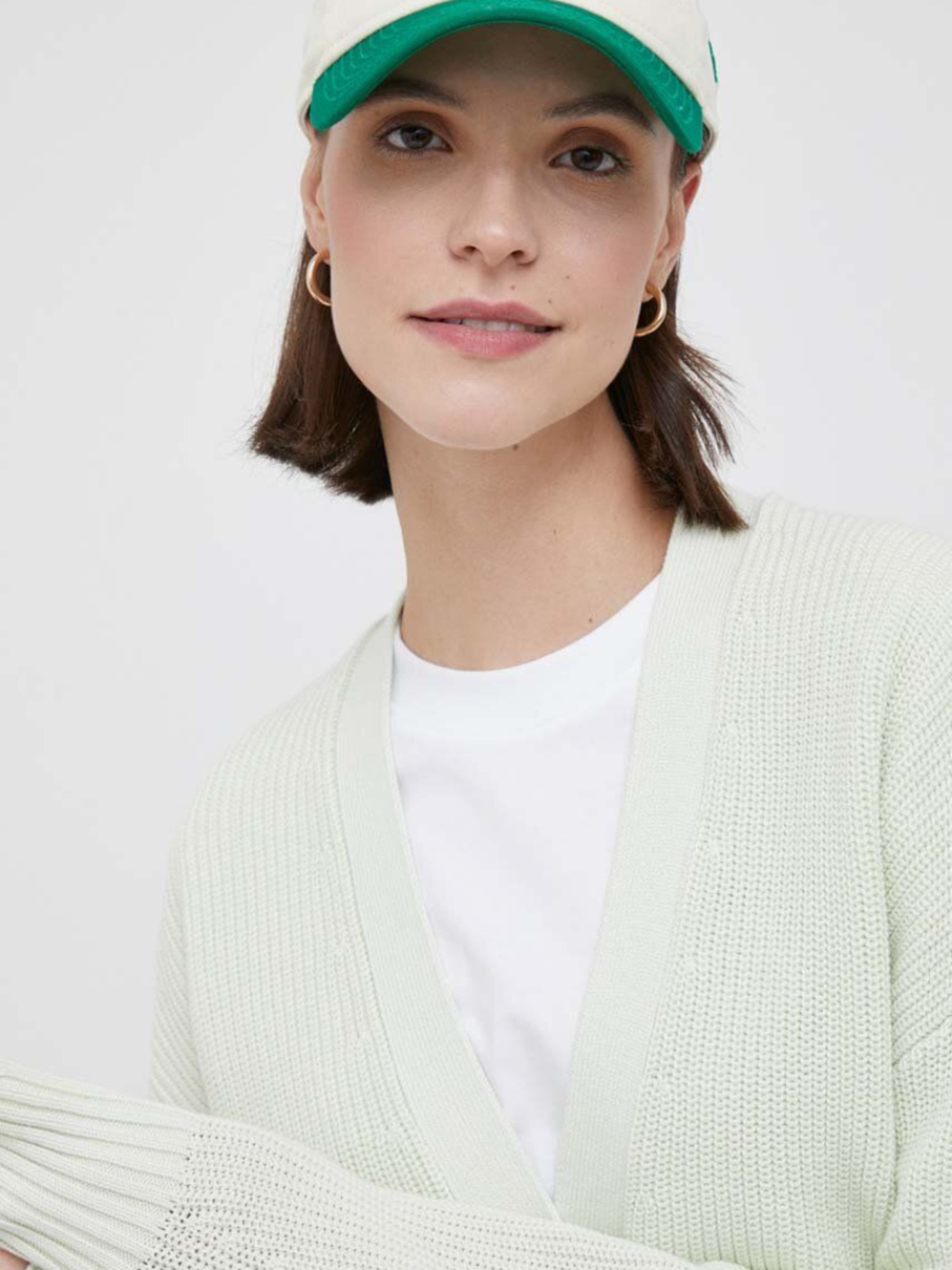 detail Calvin Klein dámský světle zelený kardigan