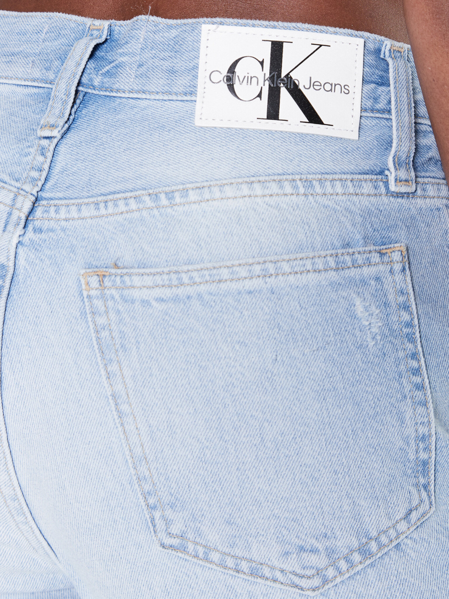 detail Calvin Klein dámské modré džíny