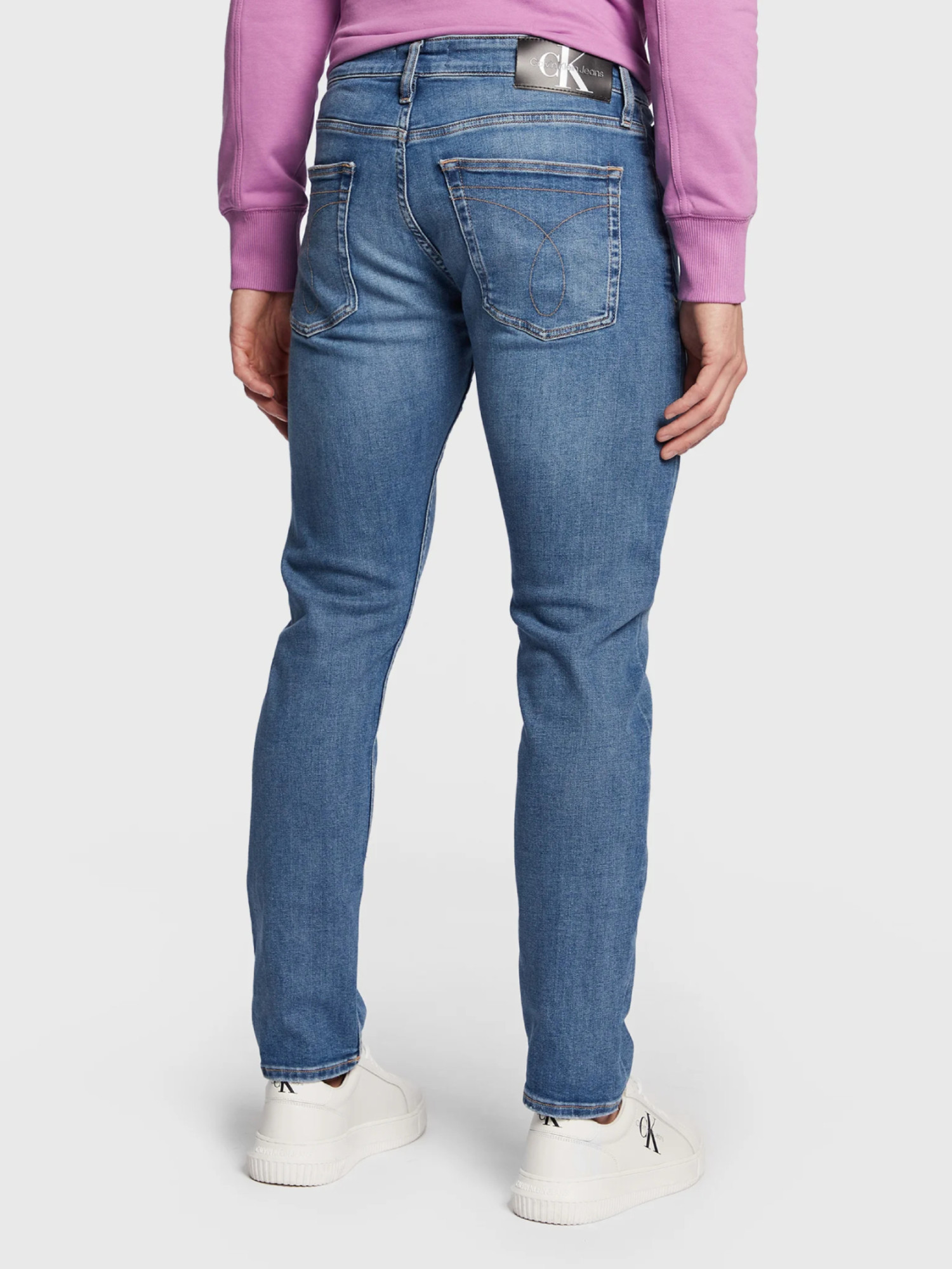 detail Calvin Klein pánské modré džíny SLIM