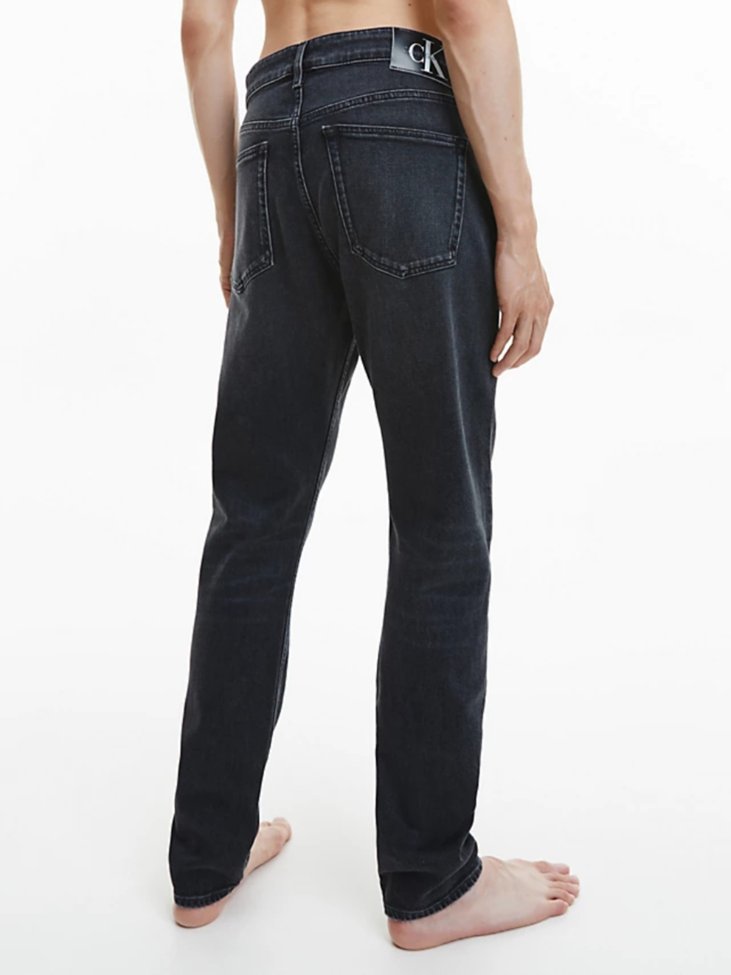 detail Calvin Klein pánské černé džíny