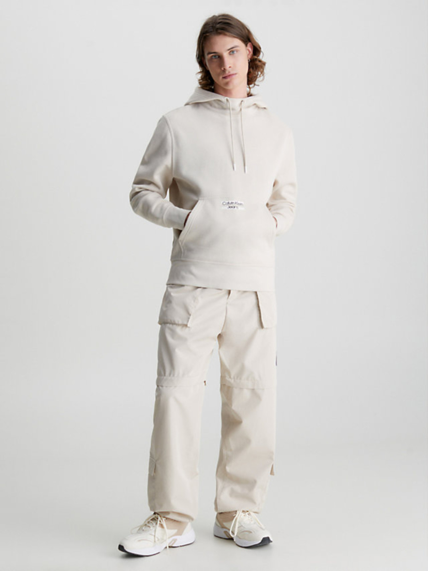 detail Calvin Klein pánská béžová mikina TRANSPARENT STRIPE LOGO