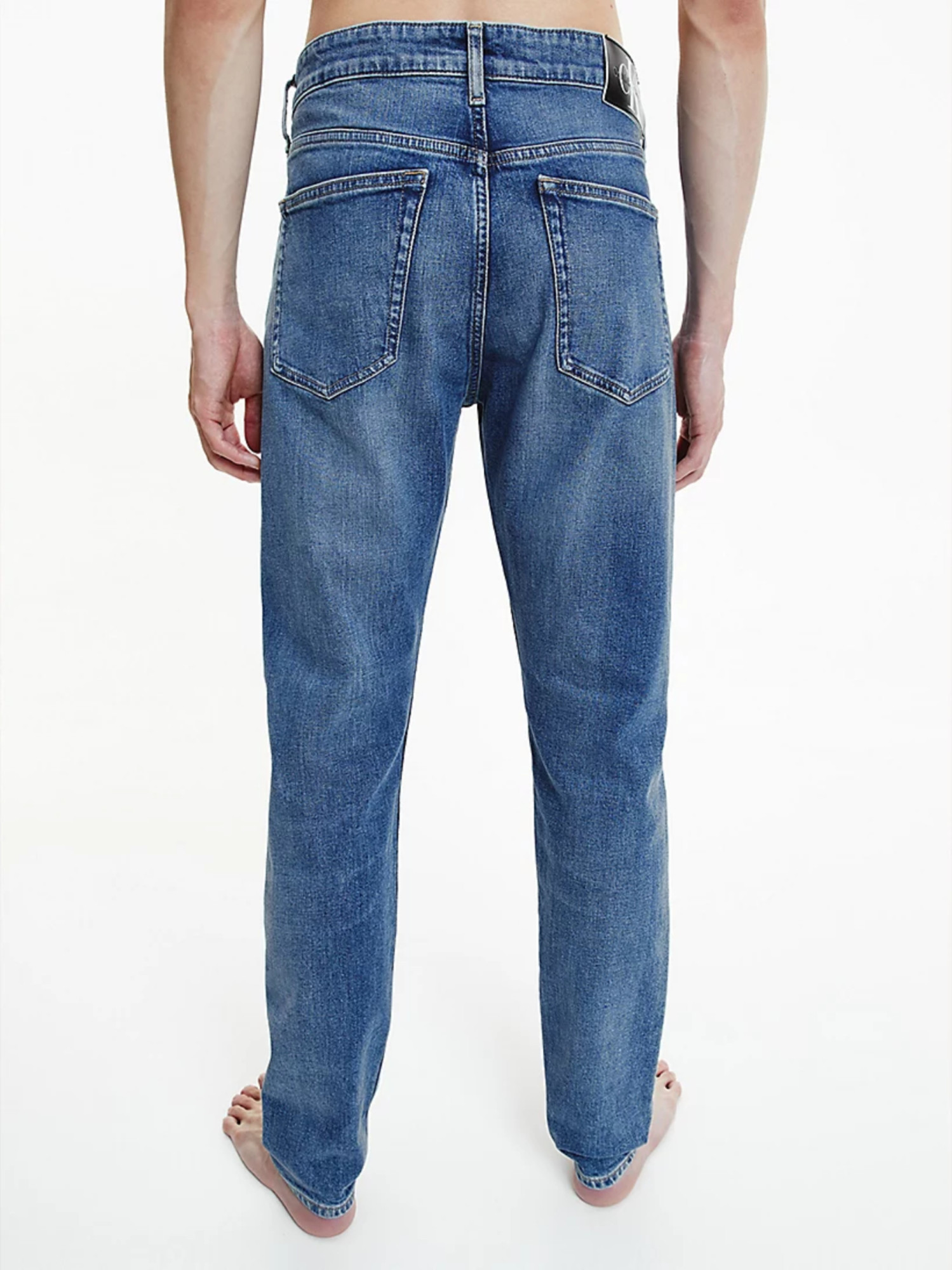 detail Calvin Klein pánské modré džíny