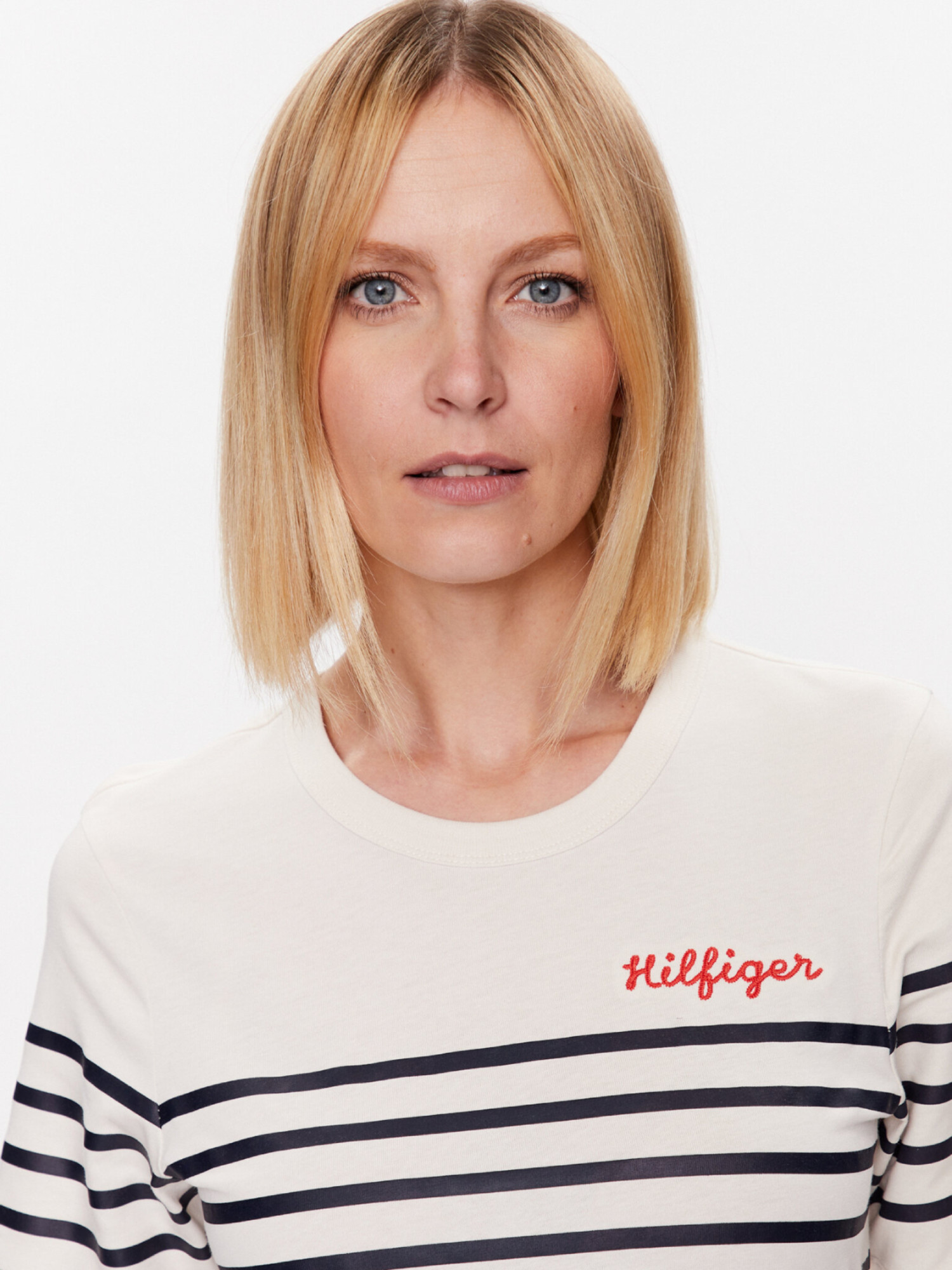 detail Tommy Hilfiger dámské krémové šaty